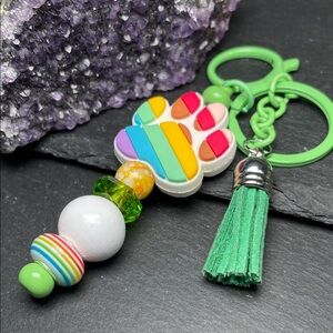 Rainbow Paw Print Artisan Keychain with Green Tassel